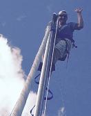 Abe White, BYC Commodore, climbing sailboat mast